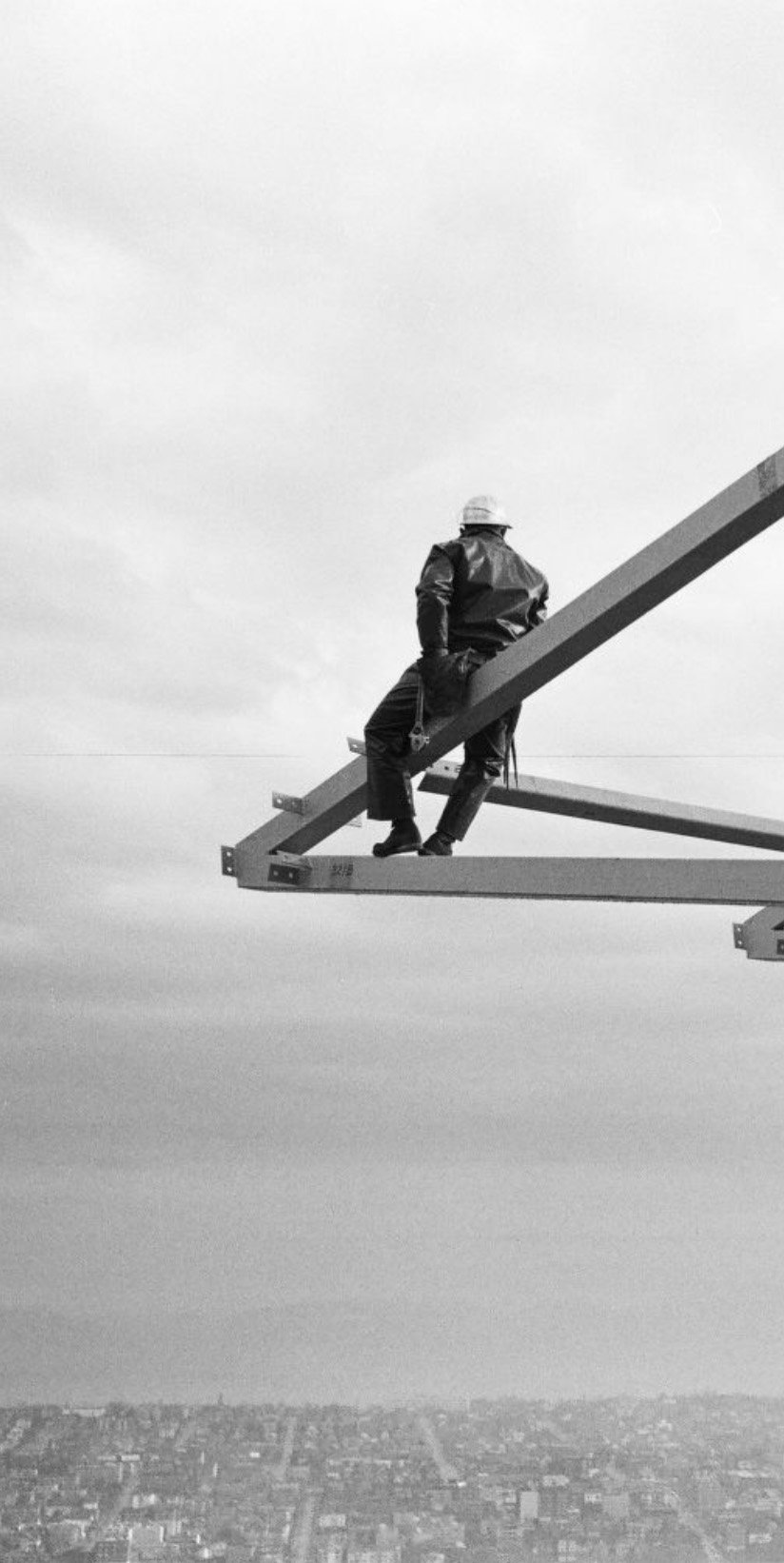 Workers on a tall building
